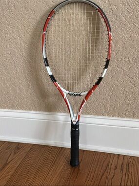 Babolat Orange & White Tennis Racket for Outdoor Play